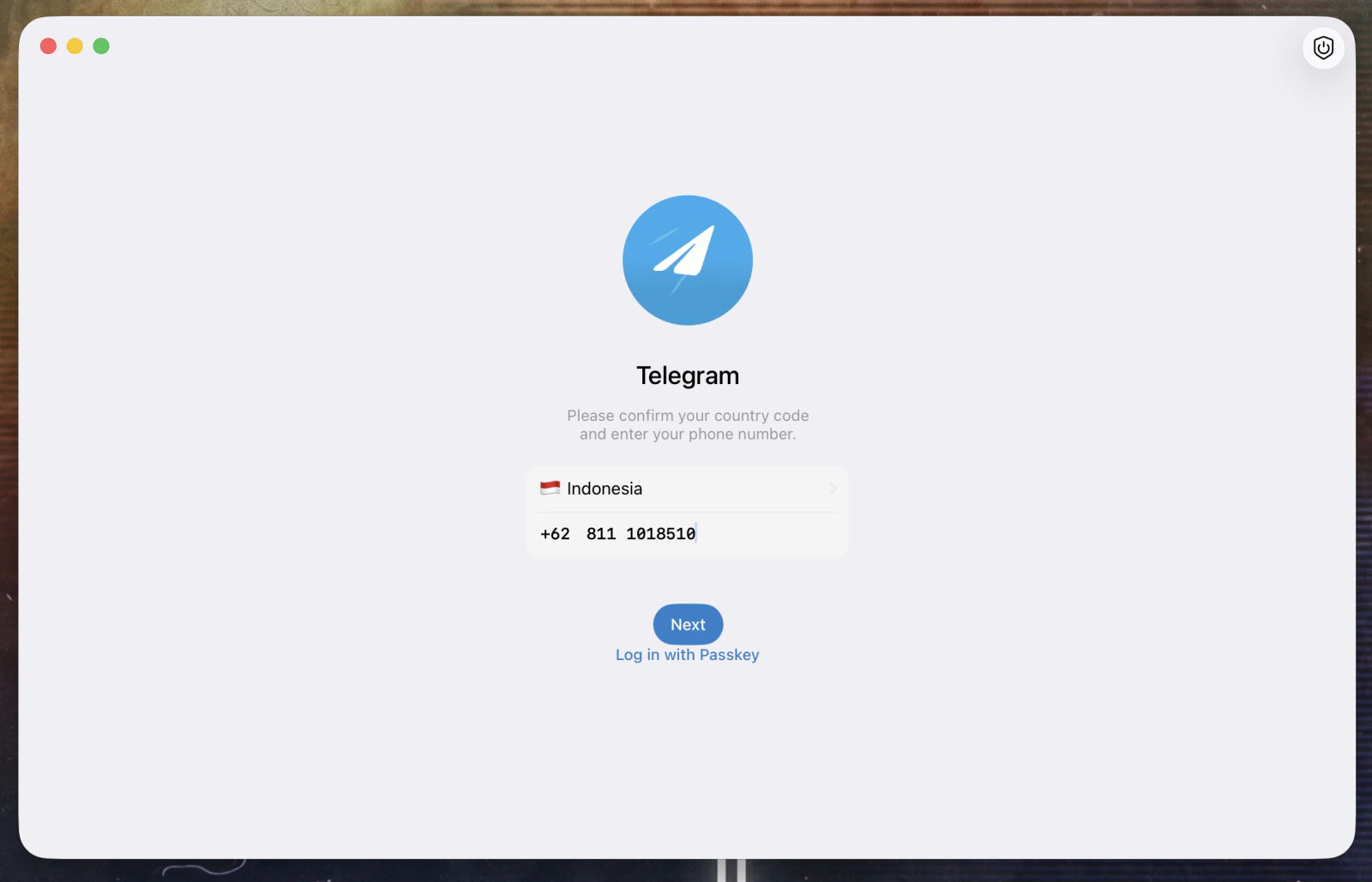 Atau login pakai <span class='em'>nomor HP</span>